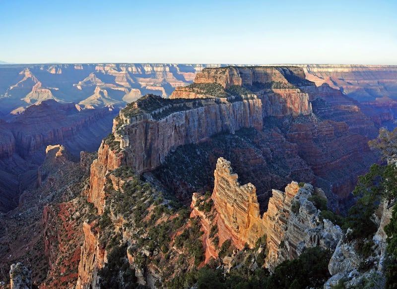 Cape Royal on the North Rim provides a panorama up, down, and across the canyon. With seemingly unlimited vistas to the east and west, it is popular for both sunrise and sunset. The sweeping turn of the Colorado River at Unkar Delta is framed through the natural arch of Angels Window. Look for the Desert View Watchtower across the canyon on the South Rim. This popular viewpoint is accessible via a paved, level trail. Cape Royal and Point Imperial are reached via a winding scenic drive. The trip to both points, with short walks at each and several stops at pullouts along the way, can easily take half a day. 

Lodging and food service facilities on the North Rim of Grand Canyon National Park are open for the summer season between May 15 and October 15 of each year. Grand Canyon Lodge North Rim, a Forever Resorts property, and Grand Canyon Trail Rides operate during this 5 month period. For more information visit: http://www.nps.gov/grca/planyourvisit/directions_n_rim.htm

NPS Photo by Michael Quinn