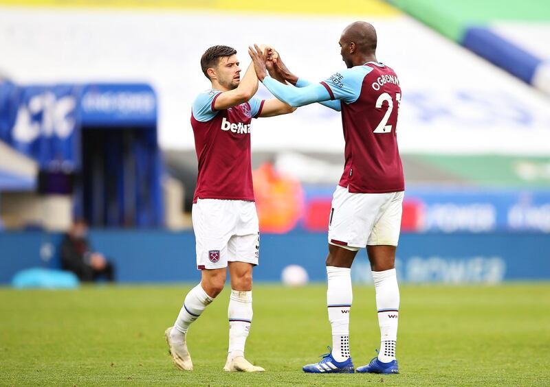 Aaron Cresswell and Angelo Ogbonna of West Ham celebrate their victory over Leicester City at The King Power Stadium. Getty