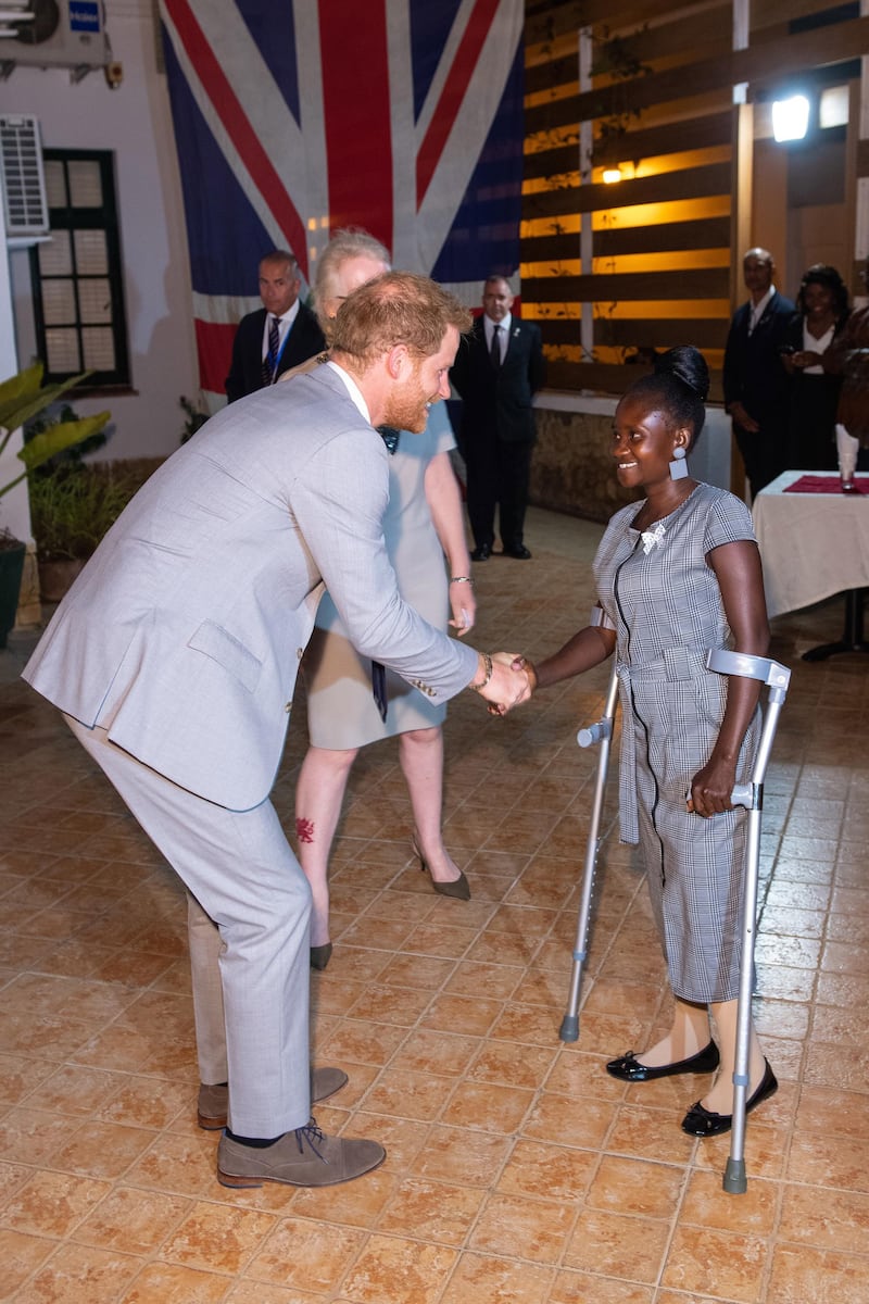 The Duke of Sussex meets landmine victim Sandra Thijika, who Princess Diana met on her visit to Angola in 1997. EPA