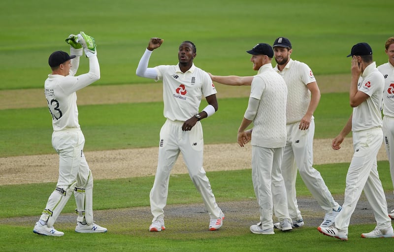 Jofra Archer celebrates with his England teammates after clean-bowling Abid Ali. Getty