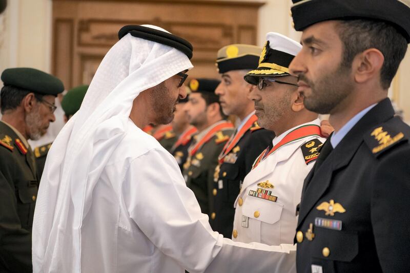 ABU DHABI, UNITED ARAB EMIRATES - April 08, 2019: HH Sheikh Mohamed bin Zayed Al Nahyan, Crown Prince of Abu Dhabi and Deputy Supreme Commander of the UAE Armed Forces (L), presents an Emirates Military Medals to members of the UAE Armed Forces, Ministry of Interior and Abu Dhabi Police, during a Sea Palace barza.

( Ryan Carter / Ministry of Presidential Affairs )
---