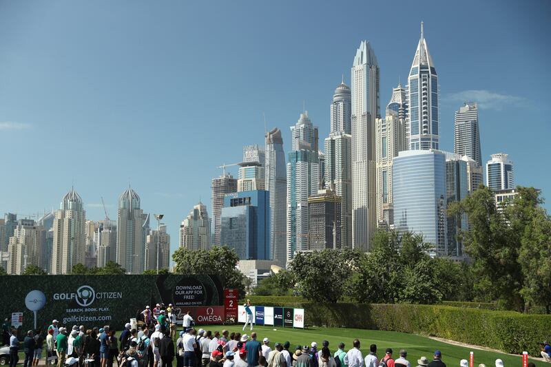 Ian Poulter tees off on the second hole during the final round of the Omega Dubai Desert Classic. David Cannon / Getty Images