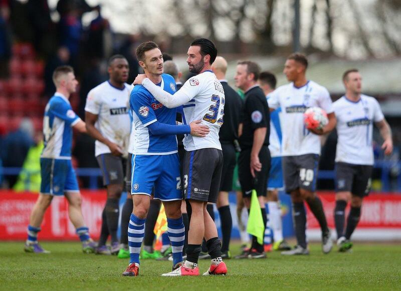 Michael Rose of Rochdale and Chris Eagles of Bury shake hands after their FA Cup second round match on Sunday, a 1-0 win for visitors Bury. Alex Livesey / Getty Images