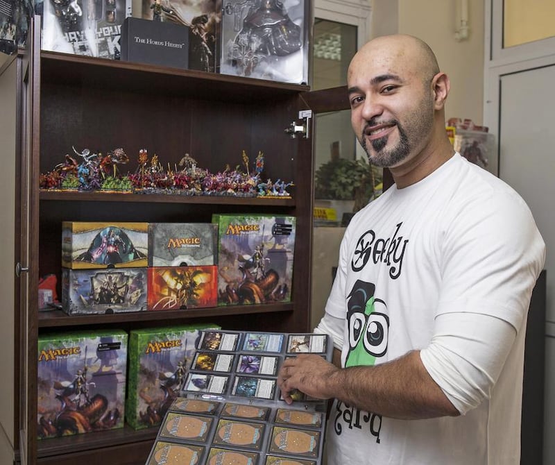 Omar Sharif, the first UAE national to win a spot in a Magic: the Gathering Grand Prix tournament, says the fantasy battle game helped him to come out of his shell when he was a boy.  Antonie Robertson / The National 