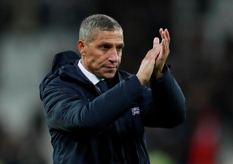 Soccer Football - Premier League - West Ham United v Brighton & Hove Albion - London Stadium, London, Britain - January 2, 2019  Brighton manager Chris Hughton applauds fans after the match        Action Images via Reuters/Andrew Couldridge  EDITORIAL USE ONLY. No use with unauthorized audio, video, data, fixture lists, club/league logos or "live" services. Online in-match use limited to 75 images, no video emulation. No use in betting, games or single club/league/player publications.  Please contact your account representative for further details.