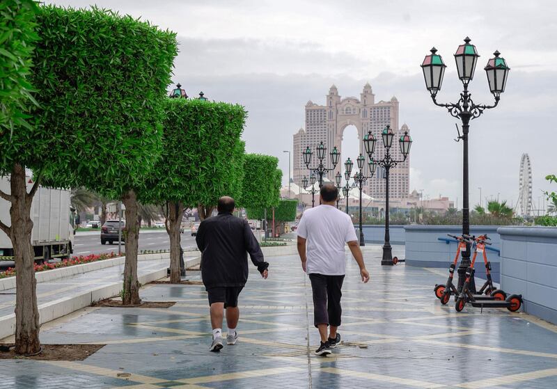 Abu Dhabi, United Arab Emirates, November 20, 2019.  
 UAE weather: rainfall and storms arrive as all schools close.
-- Abu Dhabi residents take a walk on a cool morning.
Victor Besa / The National
Section:  NA
Reporter:
