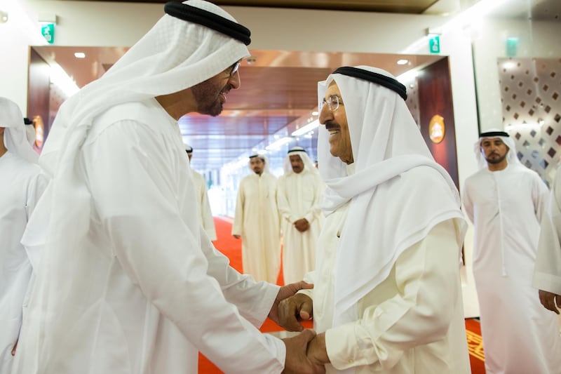 ABU DHABI, UNITED ARAB EMIRATES - October 13, 2014: HH General Sheikh Mohamed bin Zayed Al Nahyan Crown Prince of Abu Dhabi and Deputy Supreme Commander of the UAE Armed Forces (L) bids farewell to HH Sheikh Sabah Al-Ahmad Al-Jaber Al-Sabah Emir of Kuwait (R) at the Presidential Airport, after a lunch meeting at Etihad Towers. 

( Mohamed Al Hammadi / Crown Prince Court - Abu Dhabi )
---