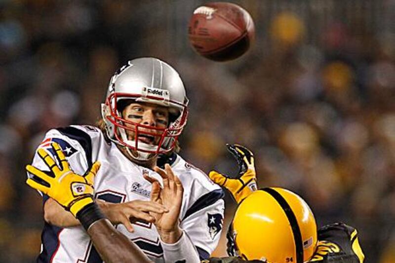 Tom Brady throws through Pittsburgh coverage.