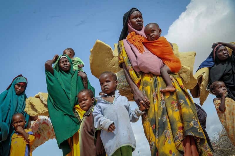 Somalis who fled drought-stricken land arrive at a makeshift camp for the displaced on the outskirts of Mogadishu. AP
