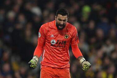 Soccer Football - Premier League - Watford v Wolverhampton Wanderers - Vicarage Road, Watford, Britain - January 1, 2020 Wolverhampton Wanderers' Rui Patricio celebrates their first goal scored by Pedro Neto REUTERS/David Klein EDITORIAL USE ONLY. No use with unauthorized audio, video, data, fixture lists, club/league logos or "live" services. Online in-match use limited to 75 images, no video emulation. No use in betting, games or single club/league/player publications. Please contact your account representative for further details.