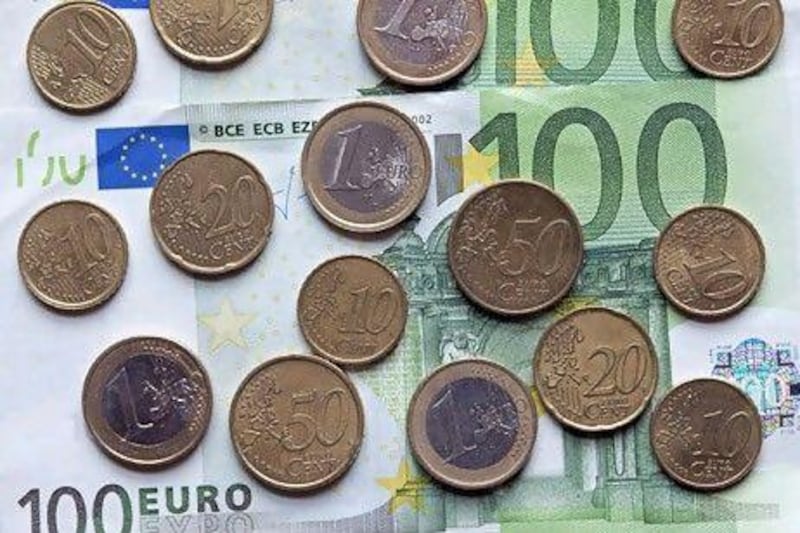 European politicians who insisted on introducing the euro in 1999 ignored the warnings of economists who predicted a single currency for all of Europe would create serious problem. Jeff Topping / The National