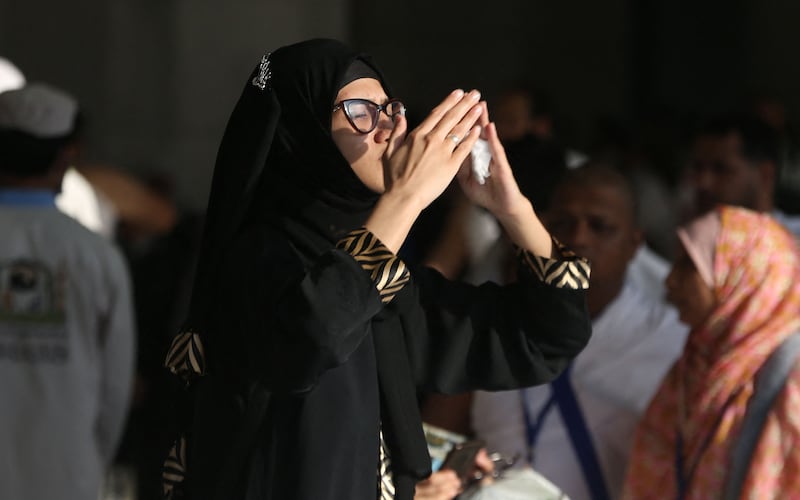 A Muslim woman prays in front of the Kaaba, Islam's holiest shrine, at the Grand Mosque. AFP