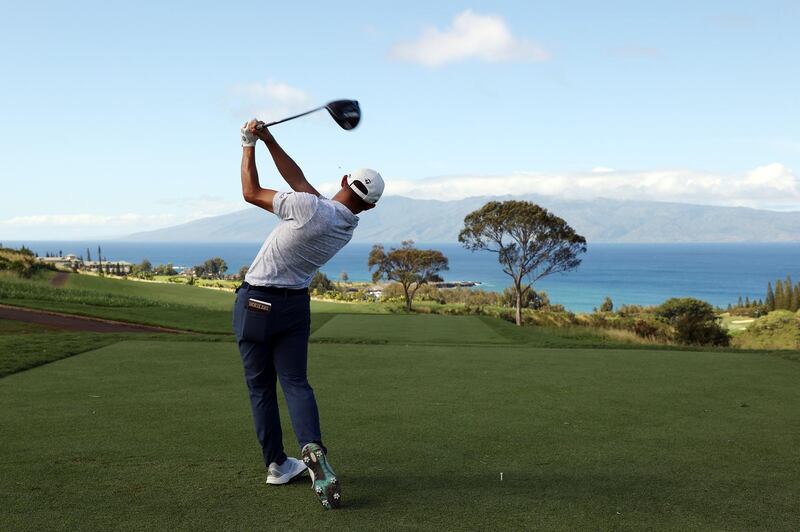 Collin Morikawa plays his shot from the seventh tee during the first round of the Sentry Tournament Of Champion. AFP