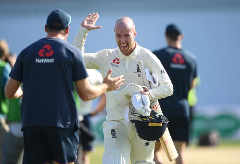 Jack Leach celebrates with Jos Buttler. Getty Images