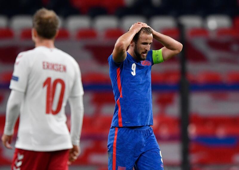 LONDON, ENGLAND - OCTOBER 14: Harry Kane of England reacts after a foul during the UEFA Nations League group stage match between England and Denmark at Wembley Stadium on October 14, 2020 in London, England. Football Stadiums around Europe remain empty due to the Coronavirus Pandemic as Government social distancing laws prohibit fans inside venues resulting in fixtures being played behind closed doors. (Photo by Toby Melville - Pool/Getty Images)