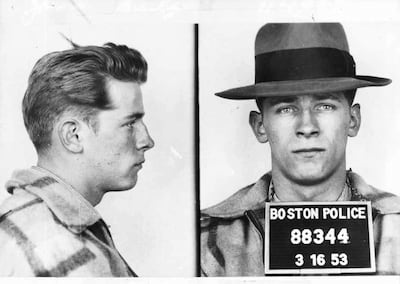 FILE - These 1953 file Boston police booking photos provided by The Boston Globe shows James "Whitey" Bulger after an arrest. Officials with the Federal Bureau of Prisons said Bulger died Tuesday, Oct. 30, 2018, in a West Virginia prison after being sentenced in 2013 in Boston to spend the rest of his life in prison. (Boston Police/The Boston Globe via AP)