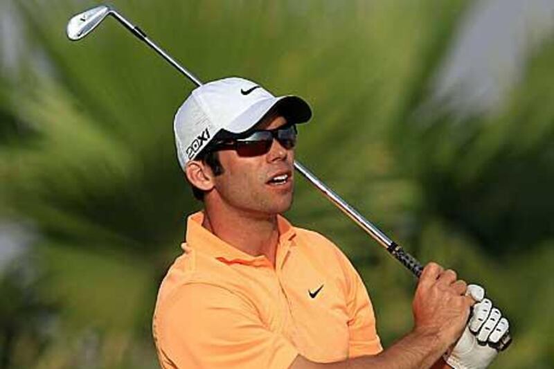 Paul Casey hit a round of 66 to move into a share of the lead with Peter Hanson in Bahrain yesterday.