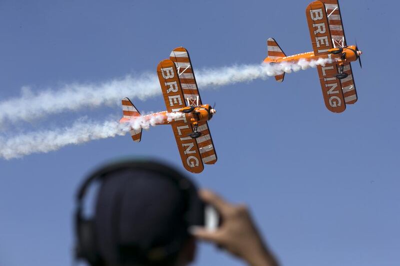 he Breitling Wingwalkers entertain the crowd at the10th Annual Al Ain Aerobatics Show. Silvia Razgova / The National