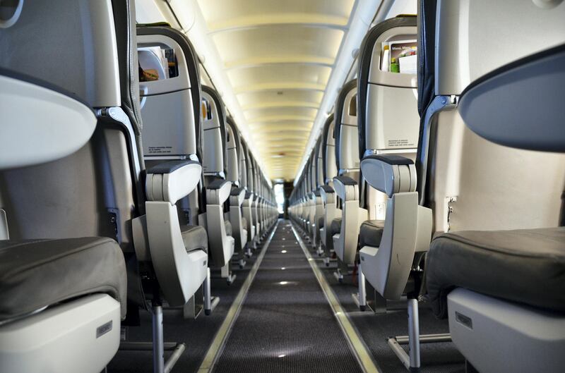 Single aisle airliner cabin interior.