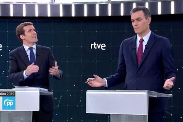 Pablo Casado, left, of the conservative People's Party, said 'the unity of Spain is at risk' due to the government of Socialist Primer Minister Pedro Sanchez, right, during a televised debate ahead of the country's general election on April 28. Reuters