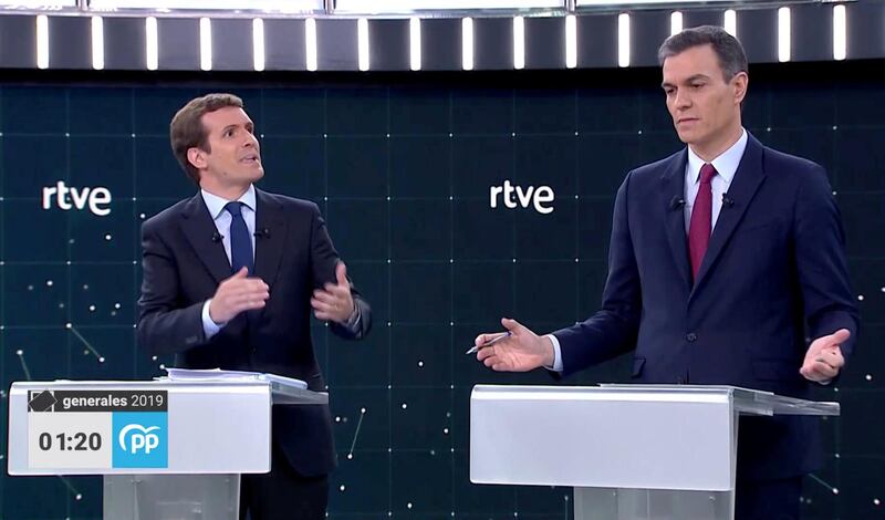 Candidates for Spanish general elections People's Party (PP) Pablo Casado and Prime Minister and Socialist Workers' Party (PSOE) Pedro Sanchez attend a televised debate ahead of general elections in Pozuelo de Alarcon, outside Madrid, Spain, April 22, 2019. TVE via REUTERS
