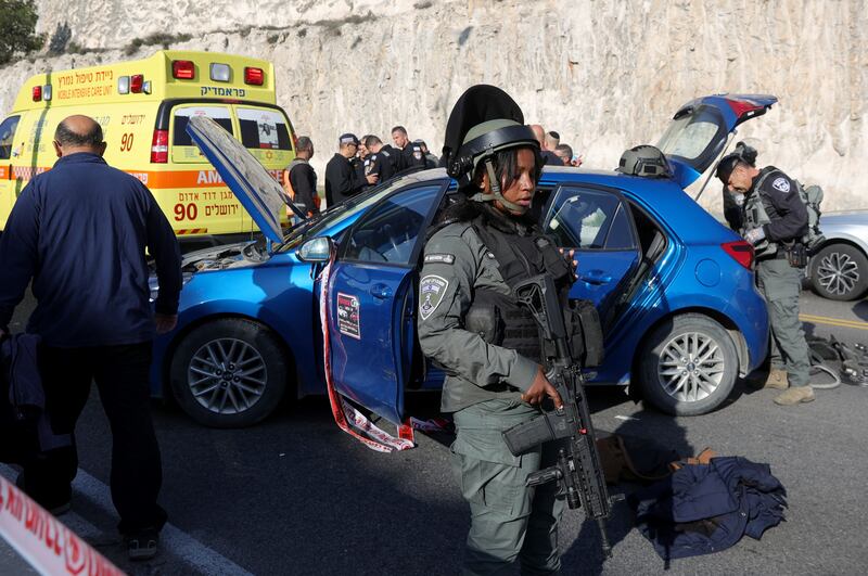 Israeli security forces and emergency services at the scene of the shooting in Ma'ale Adumim, near Jerusalem. EPA