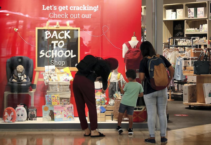 DUBAI, UNITED ARAB EMIRATES , August 13 – 2020 :-  Parents looking for the school stuff at one of the shop at the Times Square in Dubai. (Pawan Singh / The National) For News/Online/Instagram. Story by Kelly