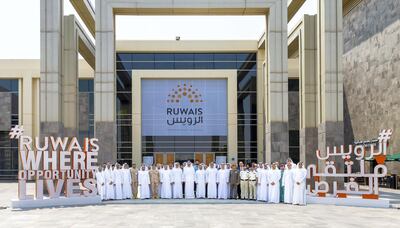 Staff from Adnoc at the launch of the town's rebranding. Courtesy: Adnoc