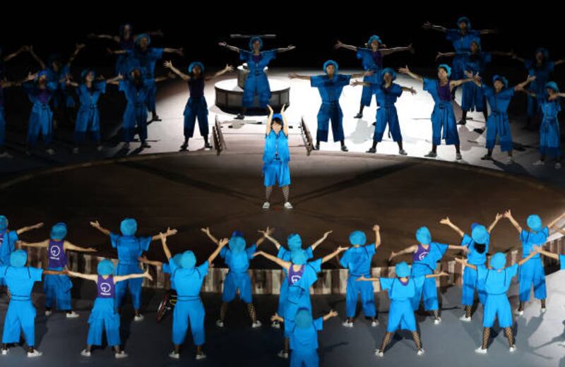 Performers dance during the opening ceremony of the Tokyo 2020 Paralympic Games. Getty