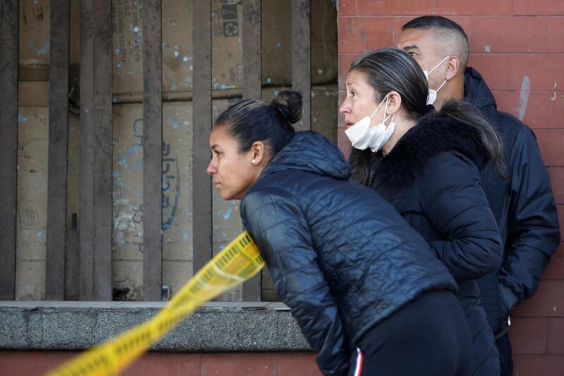 Relatives of prisoners are seen outside La Modelo prison, after a riot started by prisoners demanding government health measures against the spread of the coronavirus disease (COVID-19) in Bogota, Colombia March 22, 2020. REUTERS/Leonardo Munoz. NO RESALES. NO ARCHIVES.