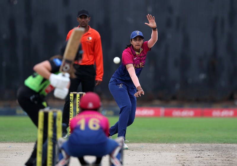 UAE captain Esha Oza bowls against English touring side Western Storm in a friendly at Malek Cricket Stadium in Ajman on March 25, 2024. All pictures: Chris Whiteoak / The National