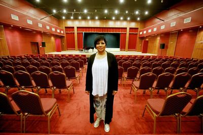 Kuwaiti opera singer Amani Hajji, poses for a picture at the Higher Institute for Musical Arts in Kuwait City on April 12, 2018. 
Hajji, Kuwait's first opera singer with a small but dedicated local following, has for the past 20 years refused to give up on her dream of making opera mainstream in her native Kuwait. / AFP PHOTO / YASSER AL-ZAYYAT