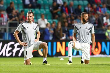 Real Madrid's Gareth Bale, left, and Karim Benzema will both miss the trip to Saudi Arabia for the Spanish Super Cup. Reuters