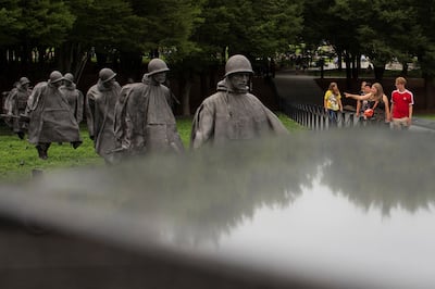 Visitors view the newly renovated Korean War Veterans Memorial on the National Mall in Washington, U. S. , July 31, 2022.  REUTERS / Tom Brenner