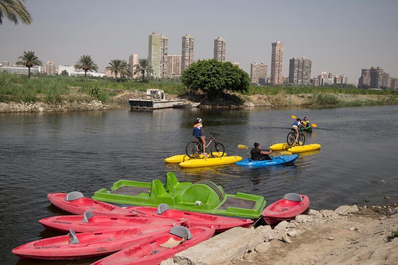 People ride water bicycles on the Nile River in Cairo, Egypt.  EPA