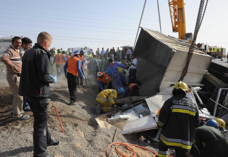 The lorry overturned and landed on the bus at 7.53am when its brakes failed, according to Brig Gen Hussein Ahmed Al Harthi, head of the Traffic and Patrols Directorate at Abu Dhabi Police. Courtesy Al Ain Police