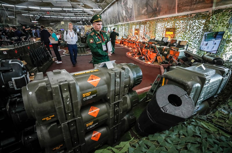 Visitors look at Ukrainian weapons