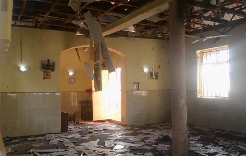 This image taken from TV, shows the interior of a mosque after a deadly attack by a suicide bomber, in Mubi, Adamawa State, Nigeria, Tuesday Nov. 21, 2017.  A teenage suicide bomber detonated as worshippers gathered for morning prayers at a mosque in northeastern Nigeria, killing at least 50 people, police said Tuesday, in one of the region's deadliest attacks in years. (AP Photo)