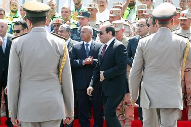 Egyptian President Abdel Fattah El Sisi walks past an honour guard in Cairo on May 15.EPA