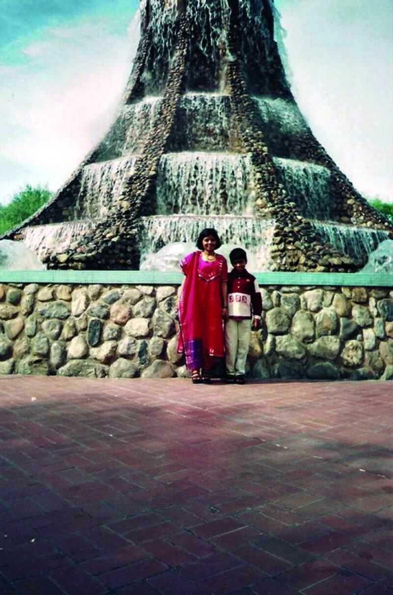 The wife and son of Abu Dhabi resident Ramesh Menon pictured in front of the Volcano Fountain in 2002. It was a popular meeting point in the city. Courtesy: Ramesh Menon