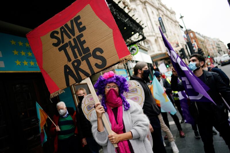 A Pantomime actor joins a demonstration to demand more support for the arts and theatre sector amid the Covid-19 coronavirus pandemic, in Central London. EPA