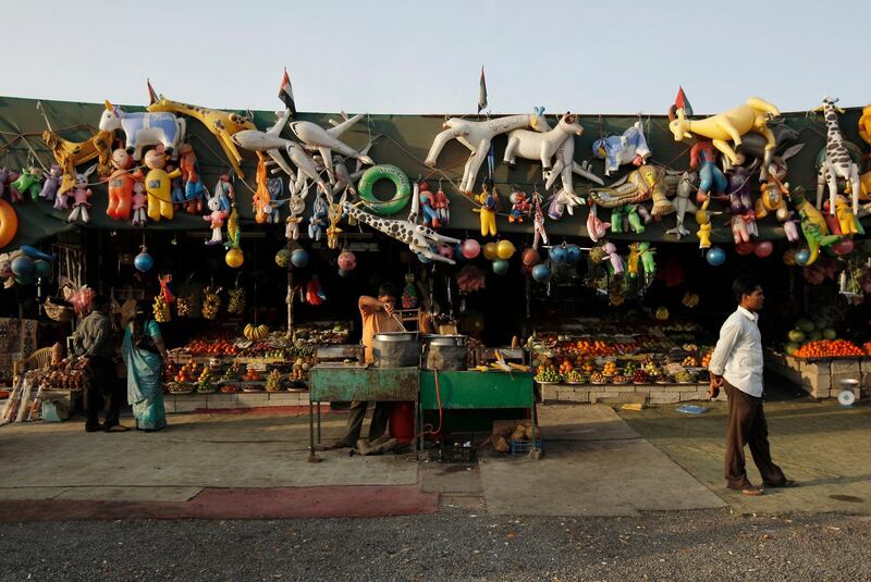 MASAFI, UNITED ARAB EMIRATES - February 26, 2009: Fruit and vegetable shops at the Friday Market. The Friday Market is located in the town of Masafi, on the way to Fujairah, as a result of the global economic downturn shop keepers say sales are lower than in previous years. 
( Ryan Carter / The National )

** For a story by Hugh Naylor *** Local Caption ***  RC011-FridayMarket.JPGRC011-FridayMarket.JPG