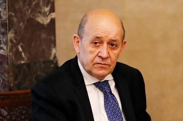 French Foreign Minister Jean-Yves Le Drian, looks on as he meets with Lebanese President Michel Aoun at the Presidential Palace in Baabda, east of Beirut, Lebanon, Thursday, May 6, 2021. Le Drian is in Beirut for two days visit to meet with Lebanese officials. (AP Photo/Hussein Malla)