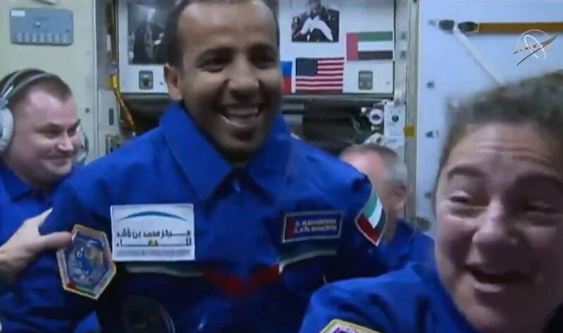 A Nasa livestream captures the moment Maj Al Mansouri enters the zero-gravity station and embraces his fellow crewmates. Courtesy: Nasa