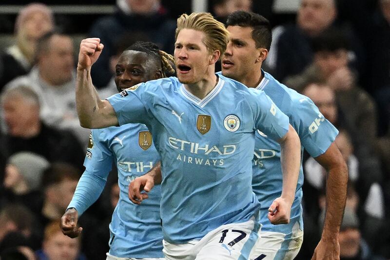 Kevin De Bruyne celebrates after scoring Manchester City's second goal in their 3-2 Premier League win against Newcastle United at St James' Park on January 13, 2024. AFP