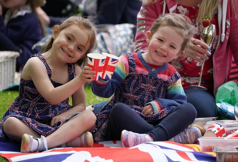 Children enjoy a street party in Edinburgh. PA