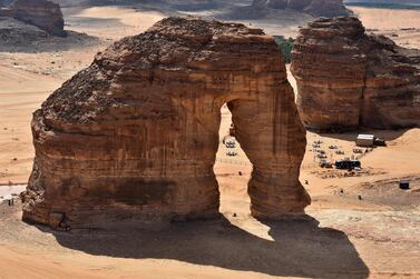 (FILES) This file photo taken on February 11, 2019, shows an aerial view of the Elephant rock in the Ula desert near the northwestern Saudi town of al-Ula. Saudi Arabia said on September 27, 2019 it will offer tourist visas for the first time, opening up the ultra-conservative kingdom to holidaymakers as part of a push to diversify its economy away from oil. Kickstarting tourism is one of the centrepieces of Crown Prince Mohammed bin Salman's Vision 2030 reform programme to prepare the biggest Arab economy for a post-oil era. / AFP / FAYEZ NURELDINE