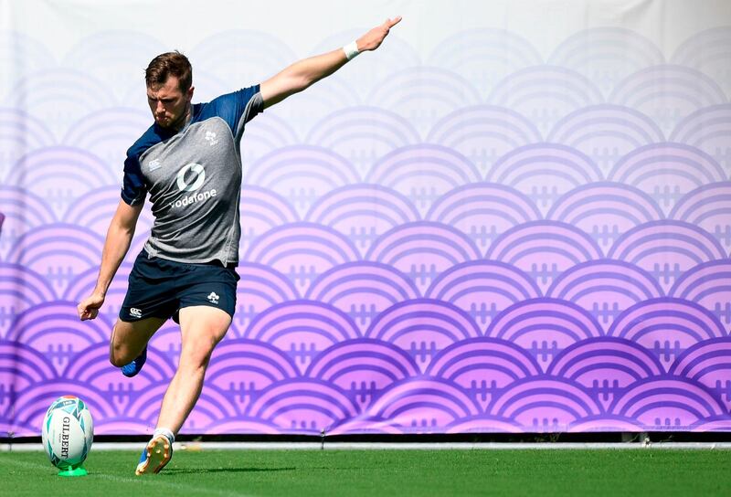 Ireland's fly-half Jack Carty kicks a ball  as he takes part in a training session at the Steelers Training Ground in Kobe during the Japan 2019 Rugby World Cup. AFP