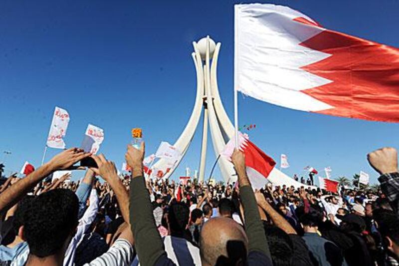 Protesters in Manama converge at Pearl Square in February. The landmark monument was demolished a month later.