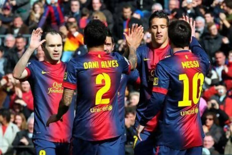 Barcelona celebrate during their 6-1 win over Getafe.